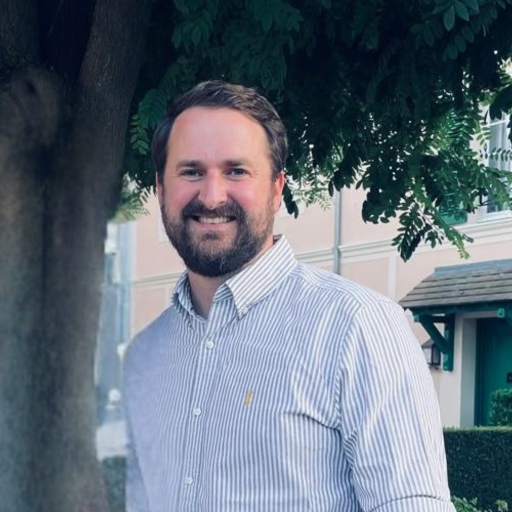 Michael Daly smiling outdoors